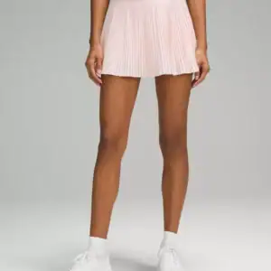 Kerina Wang - LULULEMON pink skirt