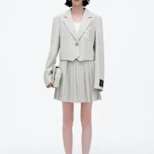 Kerina Wang - Classic All-Match Pleated Miniskirt - SelfWho