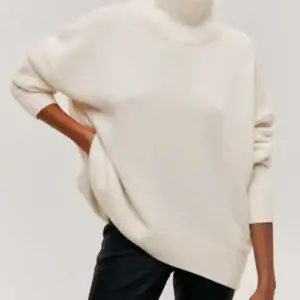 Kerina Wang - Cloudless Sky Turtleneck Oversized Sweater - Commense