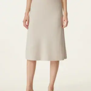 Kerina Wang - A-line Midi Skirt with Pockets - OGLMove