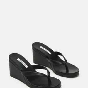 Kerina Wang - Playing Black Leather - Steve Madden