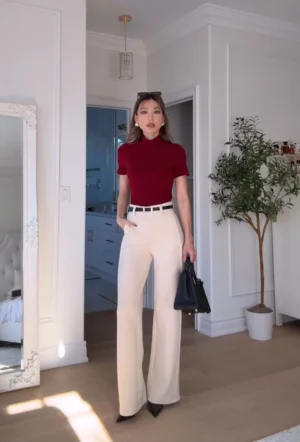Burgundy top cream trousers outfit Burgundy mockneck with cream wide leg trousers